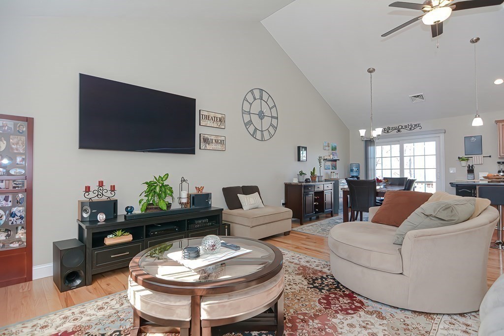 1066 Spencer Street Fall River, MA 02721 - Photo 11 of 35 a living room with furniture and a flat screen tv