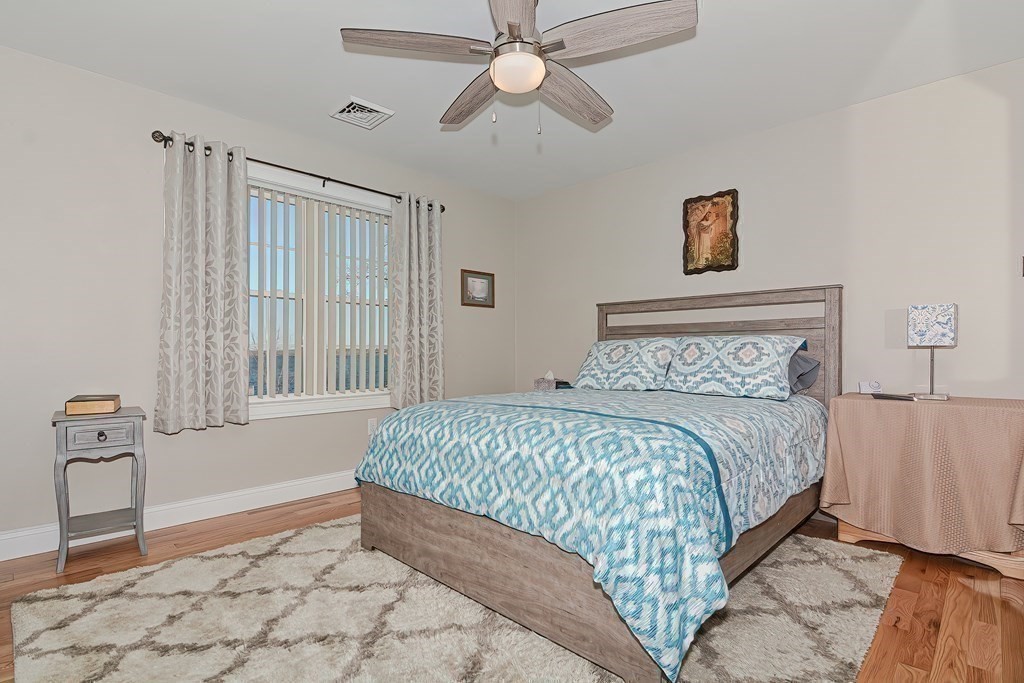 1066 Spencer Street Fall River, MA 02721 - Photo 19 of 35 a bedroom with a bed and a window