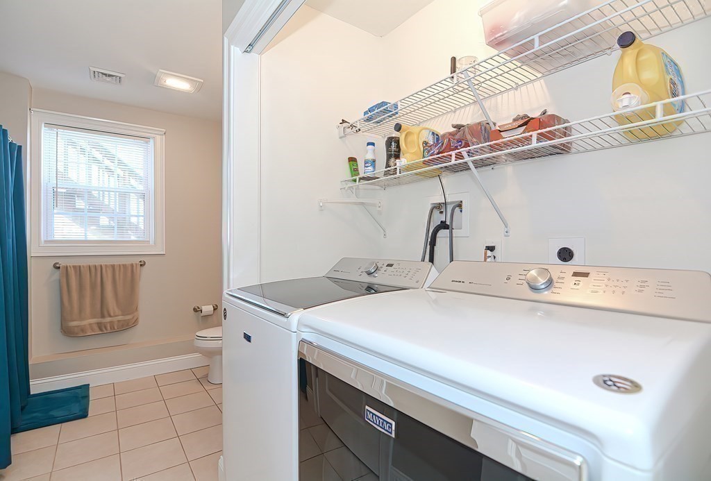 1066 Spencer Street Fall River, MA 02721 - Photo 22 of 35 a utility room with dryer and washer