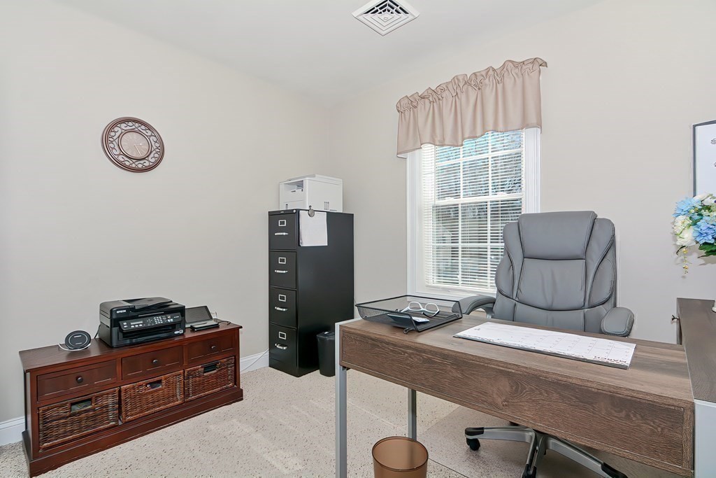 1066 Spencer Street Fall River, MA 02721 - Photo 26 of 35 a living room with furniture and a window