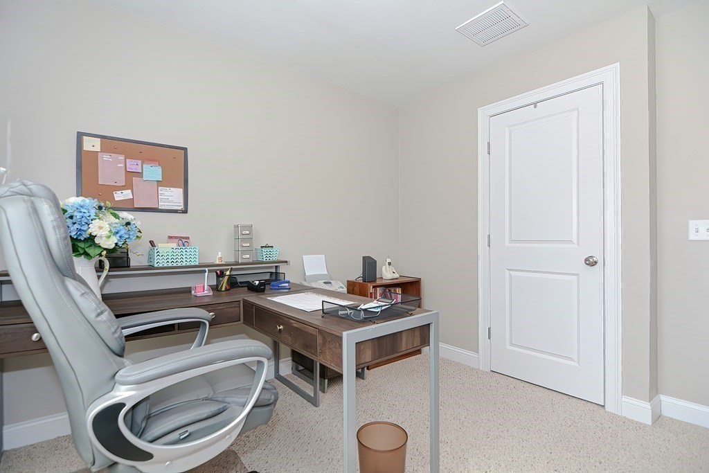 1066 Spencer Street Fall River, MA 02721 - Photo 27 of 35 a workspace with furniture and window