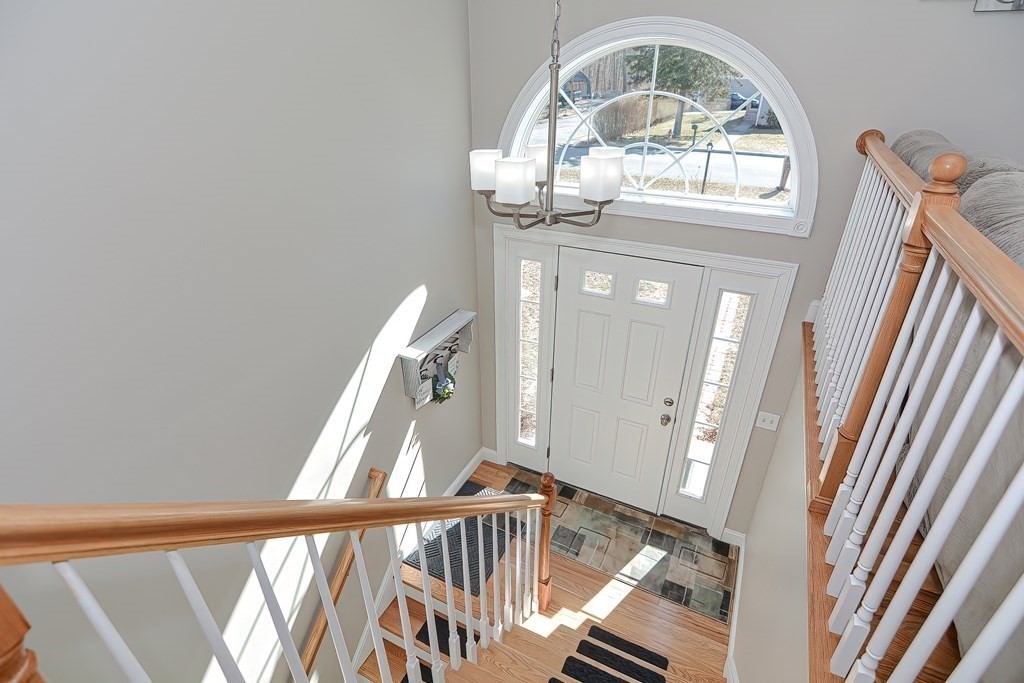 1066 Spencer Street Fall River, MA 02721 - Photo 3 of 35 a view of front door with a mirror