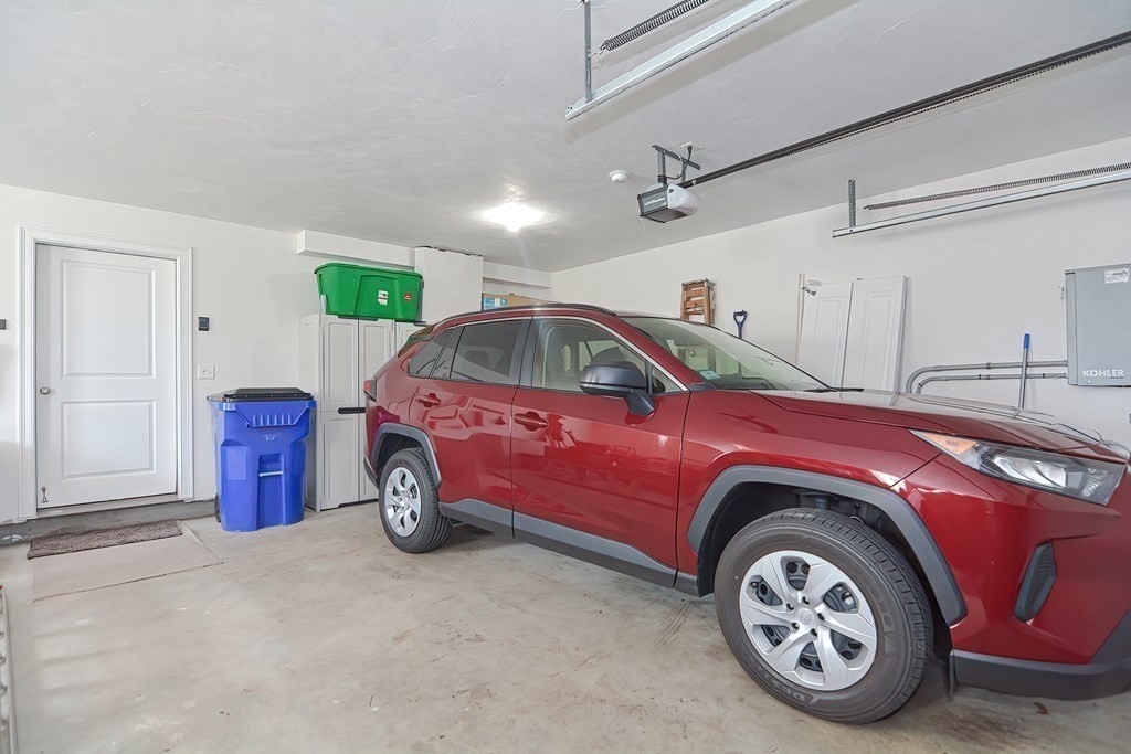 1066 Spencer Street Fall River, MA 02721 - Photo 31 of 35 a view of a garage and car parked