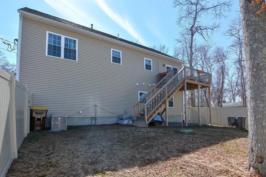 1066 Spencer Street Fall River, MA 02721 - Photo 33 of 35 a view of a house with a yard