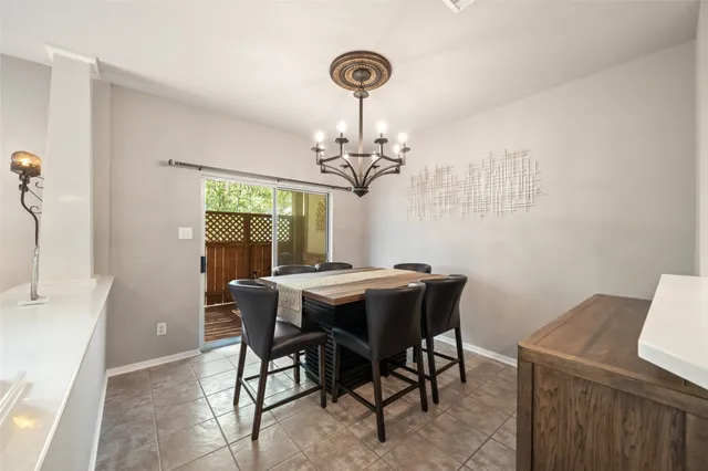 a kitchen with a sink stove top oven and cabinets