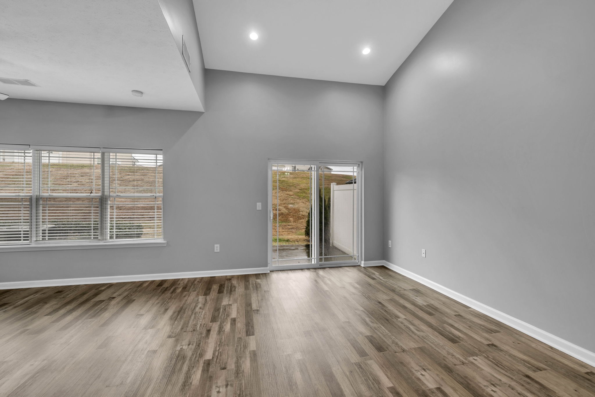 2008 Lavender Court Spring Hill, TN 37174 - Photo 11 of 51 a view of an empty room with wooden floor and a window