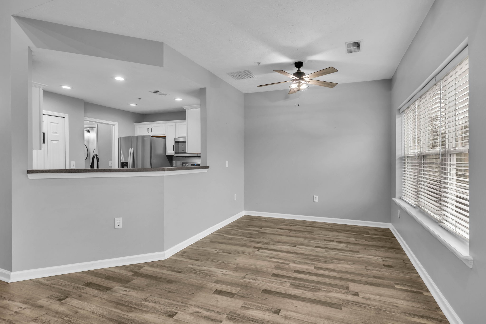 2008 Lavender Court Spring Hill, TN 37174 - Photo 16 of 51 a view of a kitchen with furniture and a ceiling fan