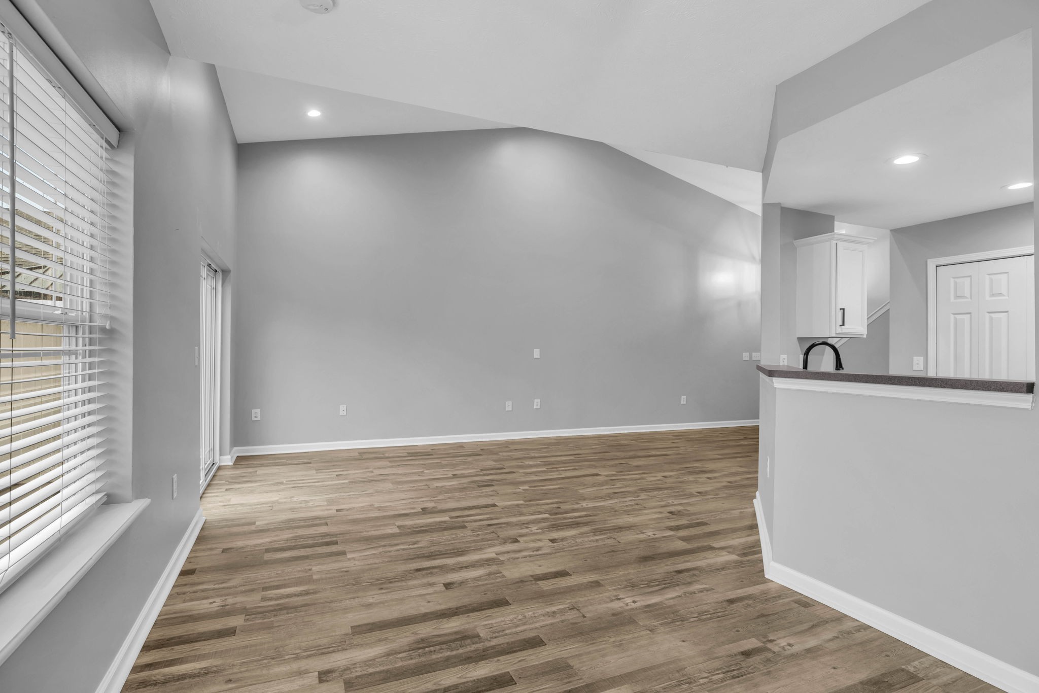 2008 Lavender Court Spring Hill, TN 37174 - Photo 19 of 51 a view of an empty room with wooden floor and a window