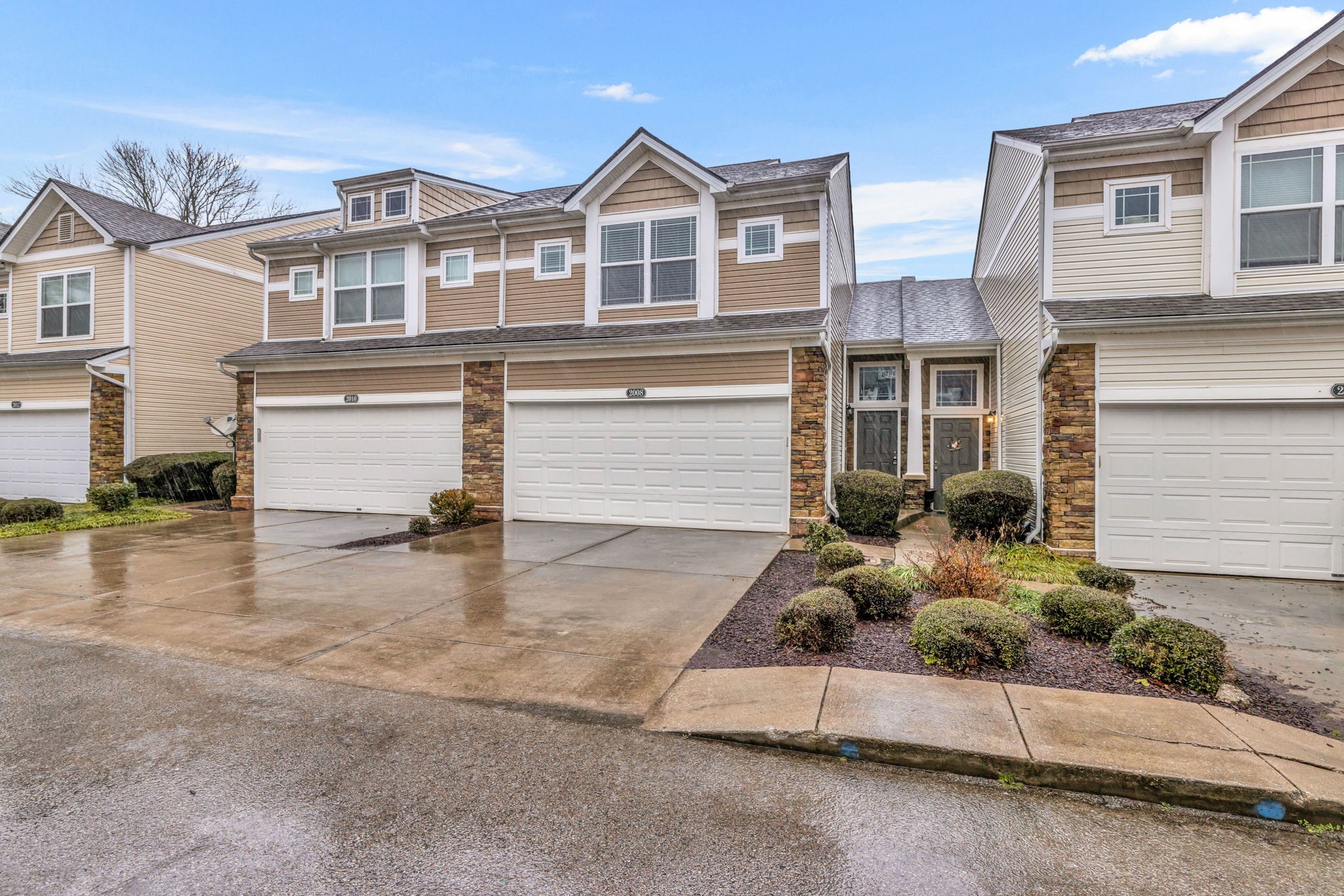 2008 Lavender Court Spring Hill, TN 37174 - Photo 2 of 51 a front view of a house with a yard and garage