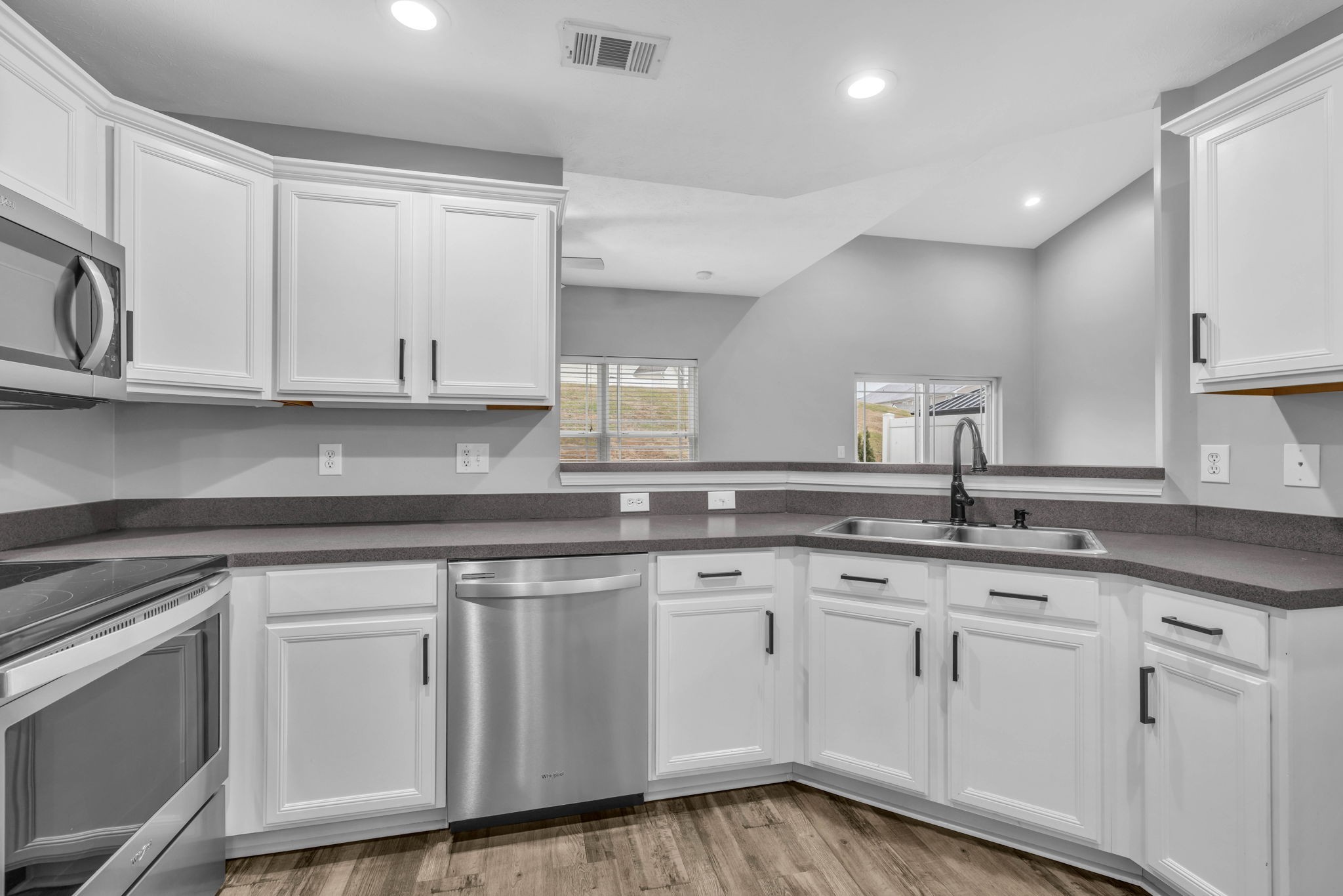 2008 Lavender Court Spring Hill, TN 37174 - Photo 23 of 51 a kitchen with granite countertop white cabinets and a sink