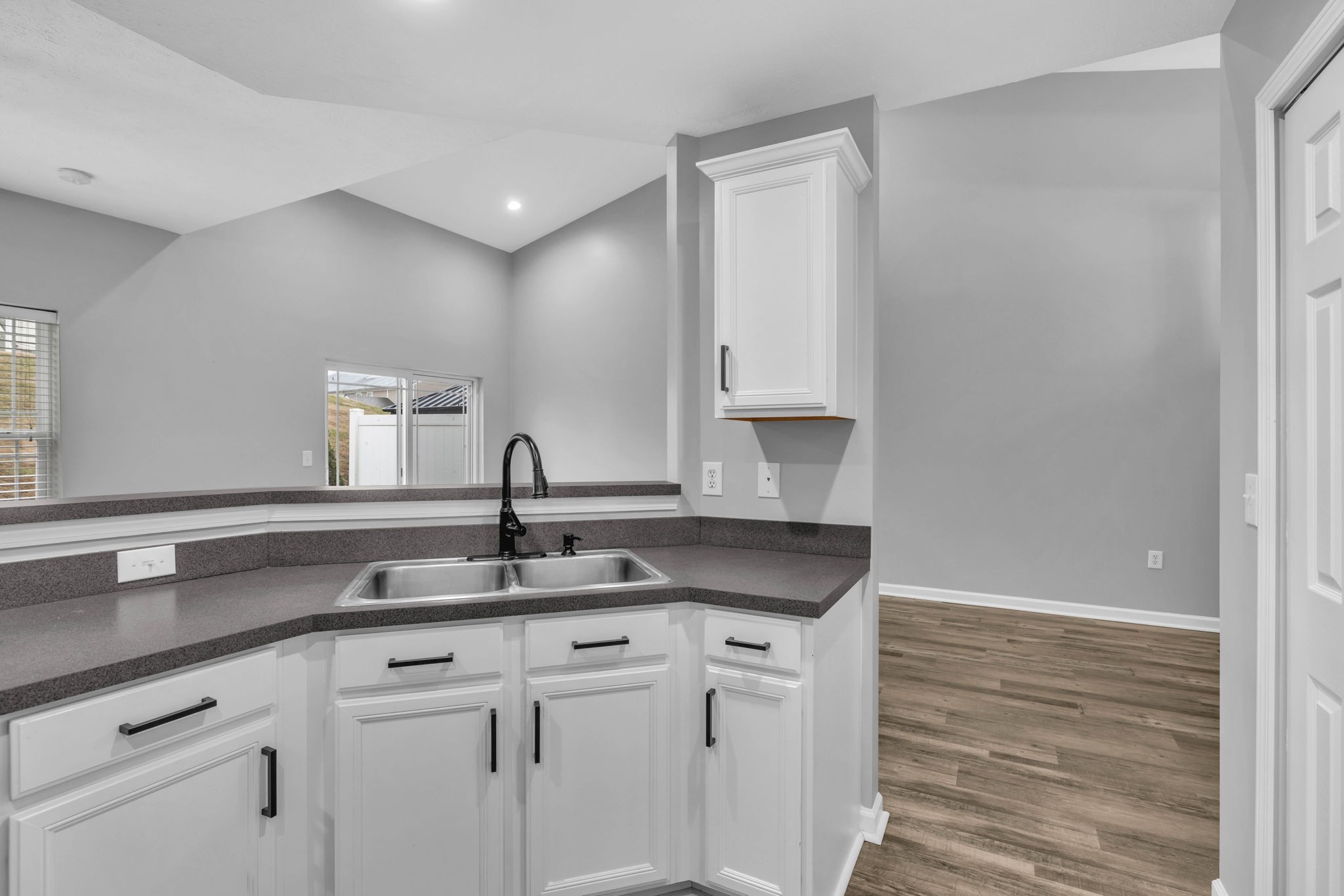 2008 Lavender Court Spring Hill, TN 37174 - Photo 24 of 51 a kitchen with granite countertop white cabinets and a sink