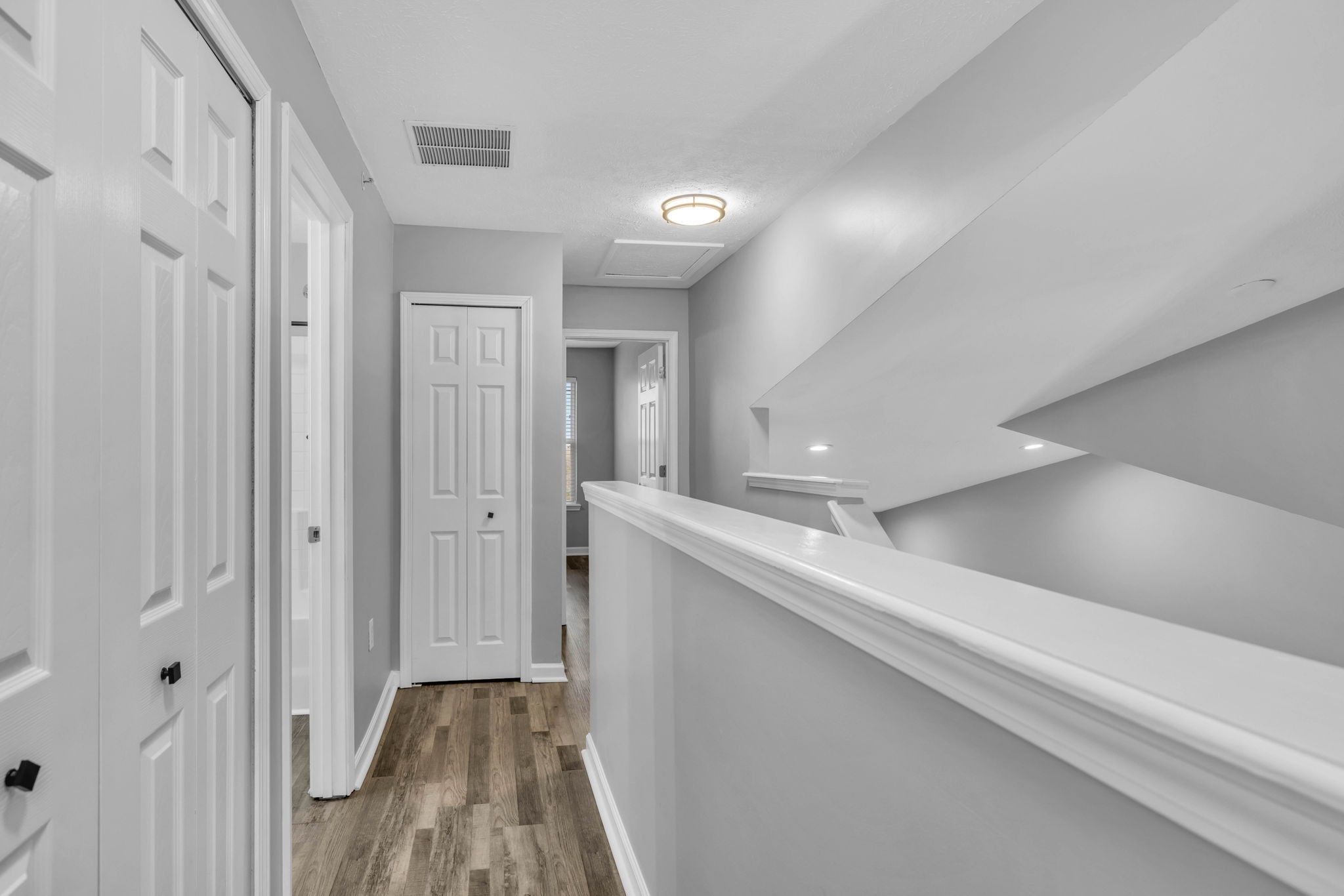 2008 Lavender Court Spring Hill, TN 37174 - Photo 42 of 51 a view of hallway with stairs and wooden floor
