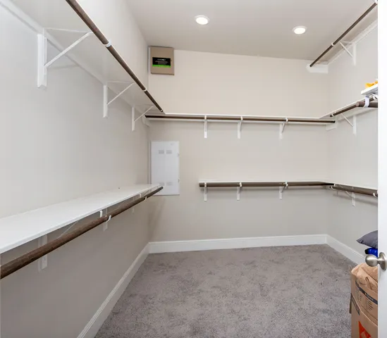 a view of an empty walk in closet