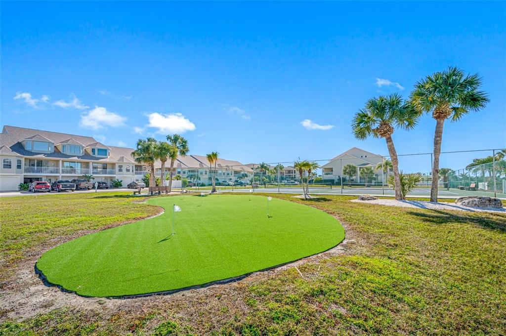 8251 Brent Street, Unit 912 Port Richey, FL 34668 - Photo 32 of 84 a view of a swimming pool and outdoor space