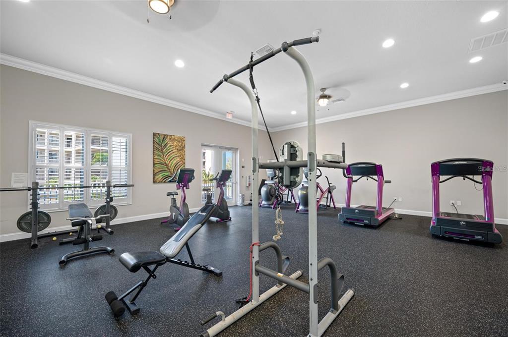 8251 Brent Street, Unit 912 Port Richey, FL 34668 - Photo 34 of 84 a view of a room with gym equipment