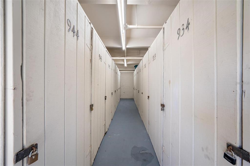 8251 Brent Street, Unit 912 Port Richey, FL 34668 - Photo 44 of 84 a view of staircase with lots of white walls