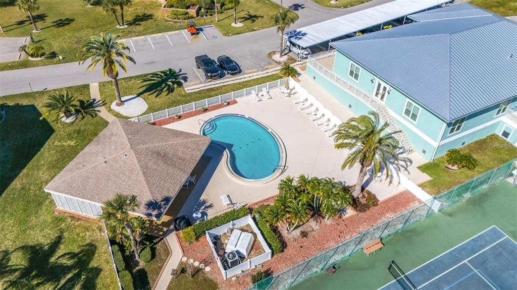 8251 Brent Street, Unit 912 Port Richey, FL 34668 - Photo 55 of 84 an aerial view of a house with a swimming pool