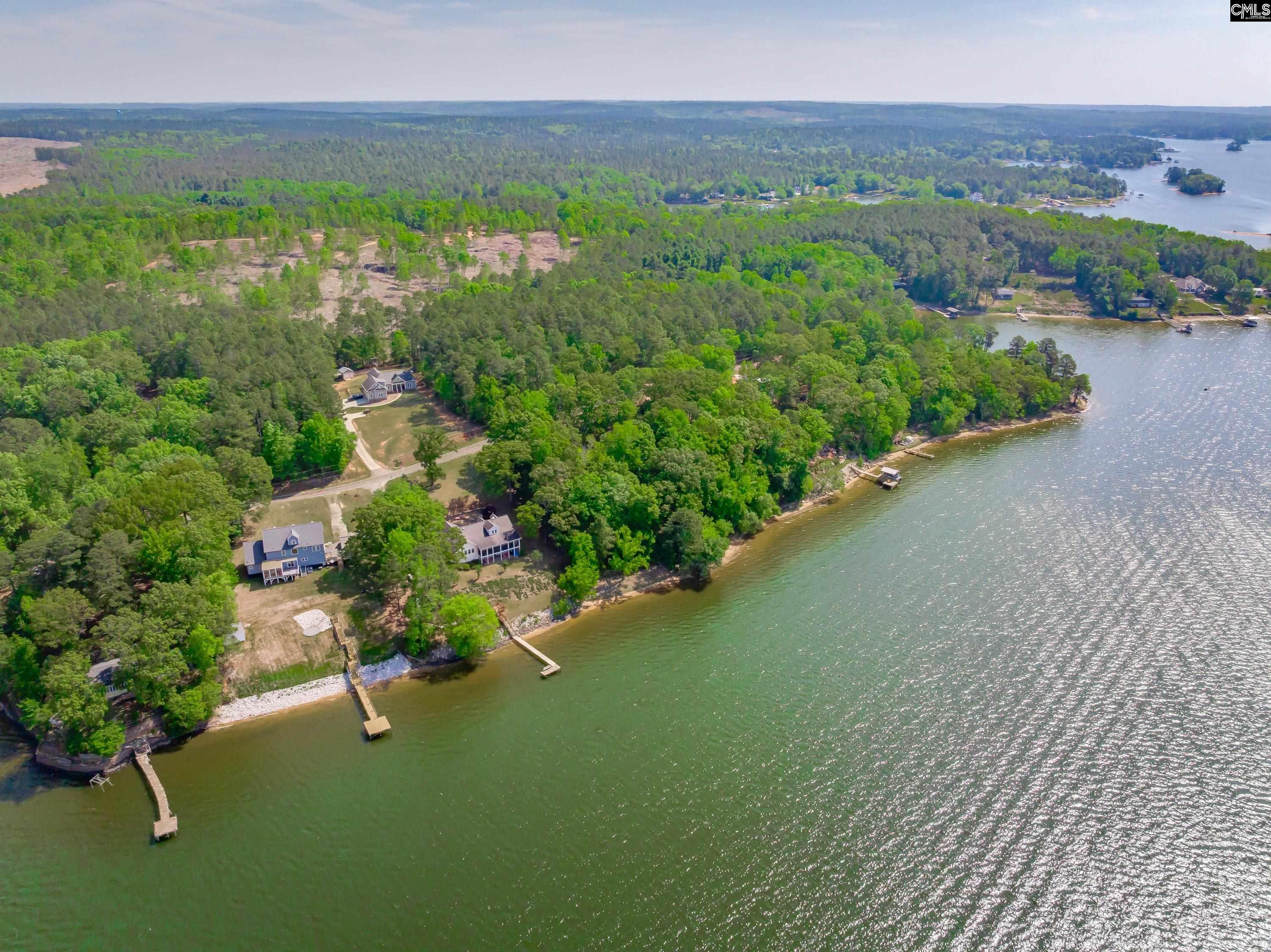 2577 Harbor View Road Camden, SC 29020 - Photo 40 of 42 a view of a lake with a city
