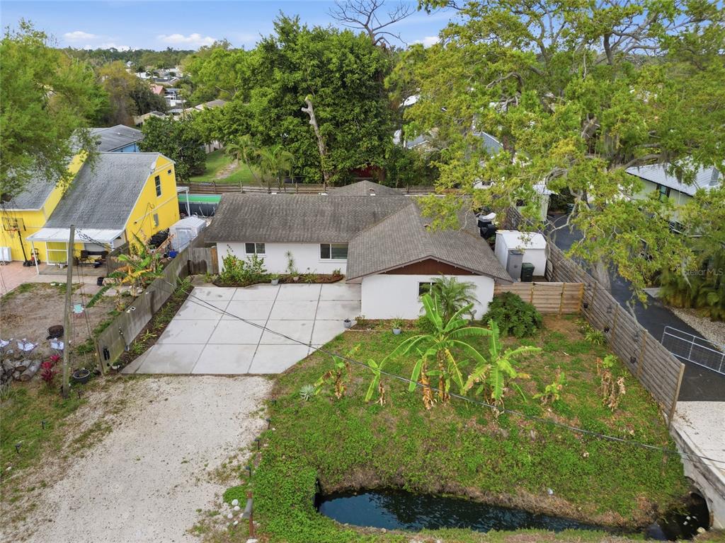 4576 Bliss Road Sarasota, FL 34233 - Photo 34 of 40 an aerial view of a house with garden space and street view