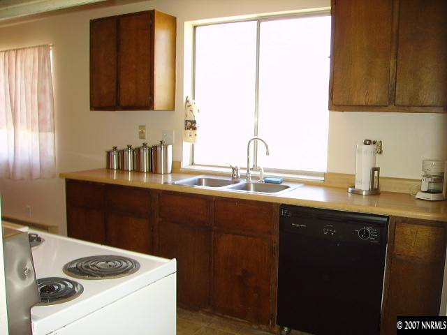 3465 Becard Lane Reno, NV 89508 - Photo 4 of 9 a utility room with sink dryer and washer