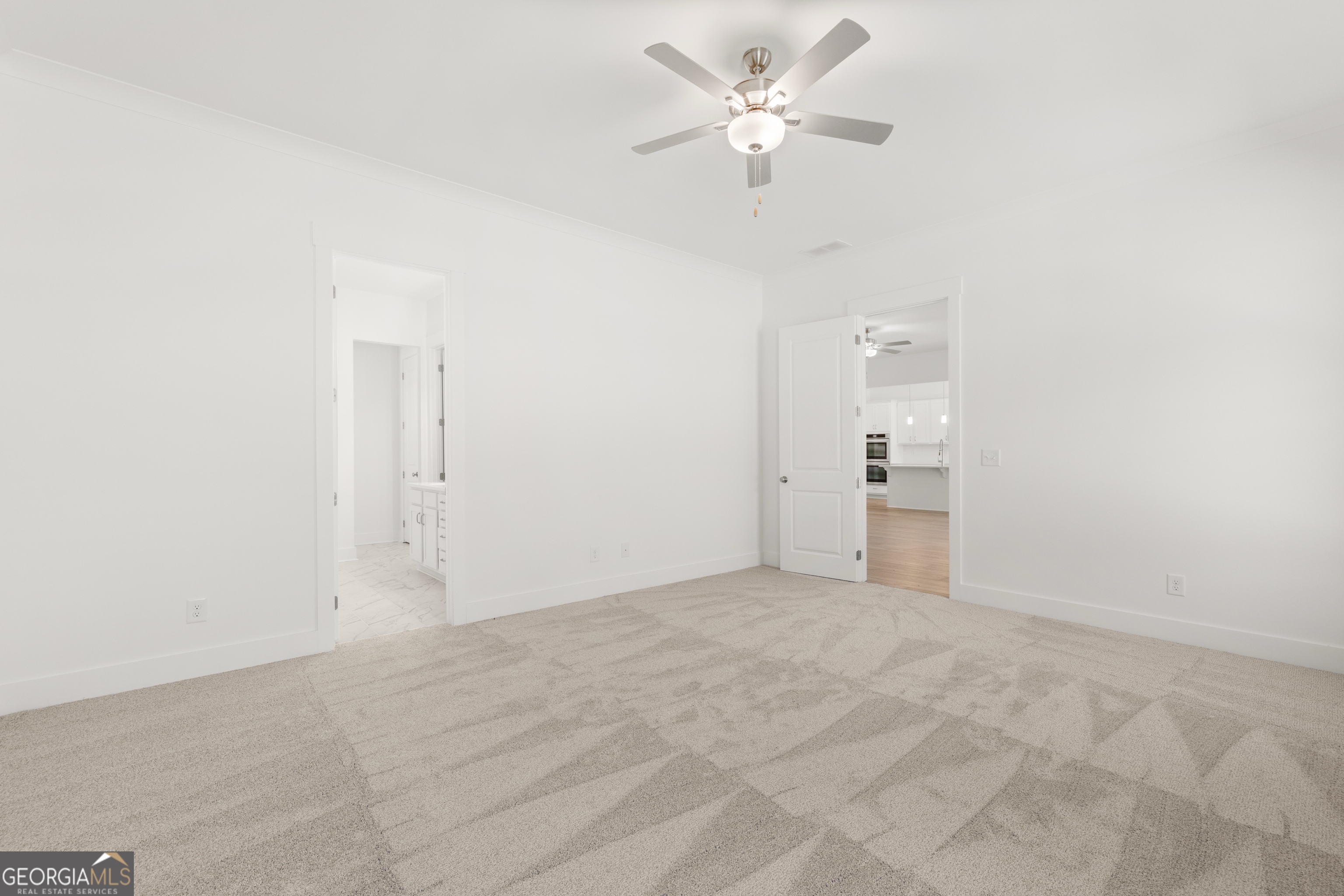 15 Overview Court Hoschton, GA 30548 - Photo 23 of 43 a view of a big room with closet and a ceiling fan
