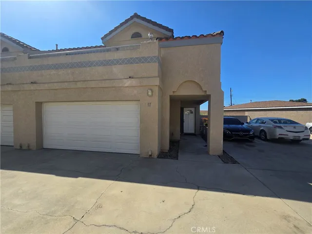 a car parked in front of a house