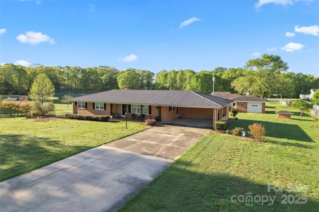 $1,300,000 | 36984 B Carter Road, New London, NC 28127
