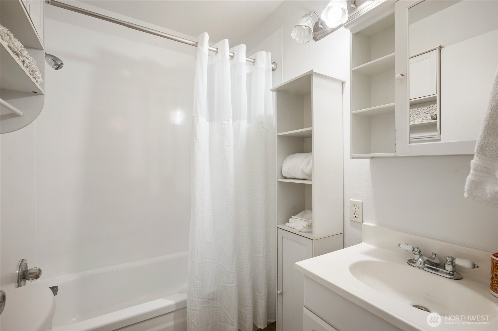 2014 Southwest 152nd Street Burien, WA 98166 - Photo 20 of 21 a bathroom with a sink and a mirror