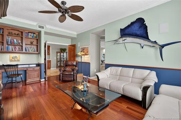a very nice looking dining room with furniture window and outside view