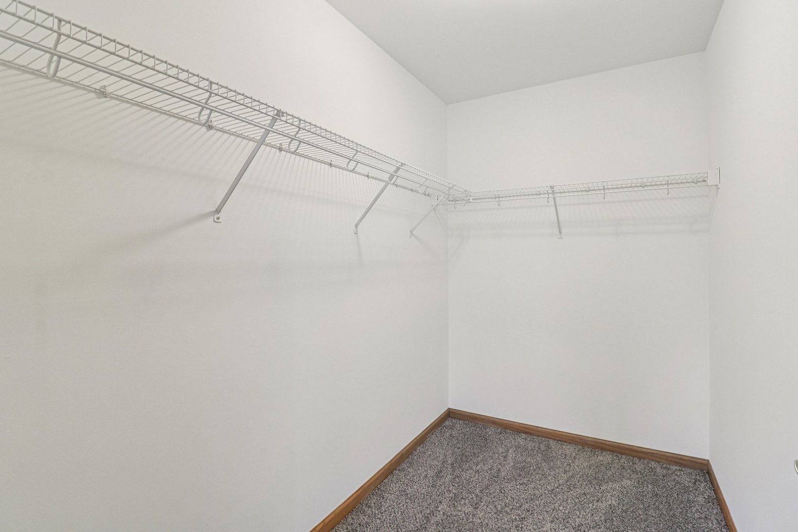905 Randall Court Marengo, IL 60152 - Photo 18 of 28 a view of a room with racks on the wall