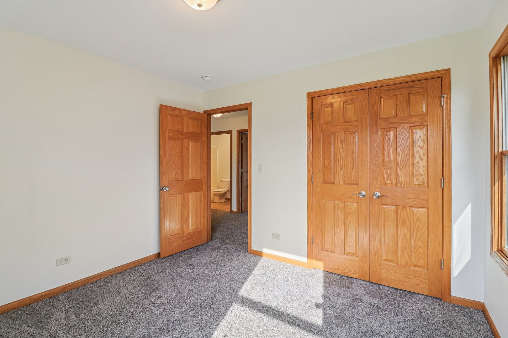 905 Randall Court Marengo, IL 60152 - Photo 19 of 28 an empty room with closet area