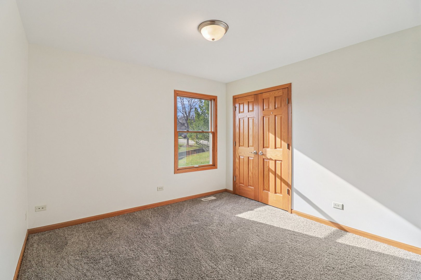 905 Randall Court Marengo, IL 60152 - Photo 22 of 28 an empty room with windows