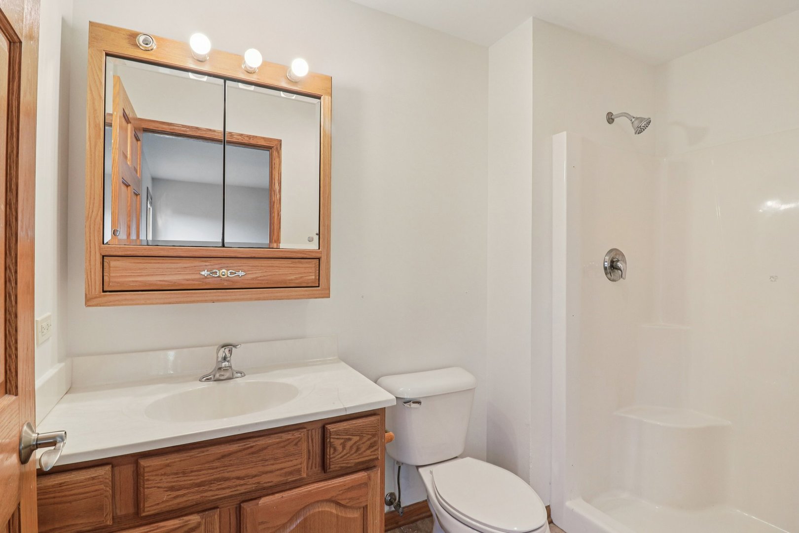 905 Randall Court Marengo, IL 60152 - Photo 23 of 28 a bathroom with a sink and a toilet