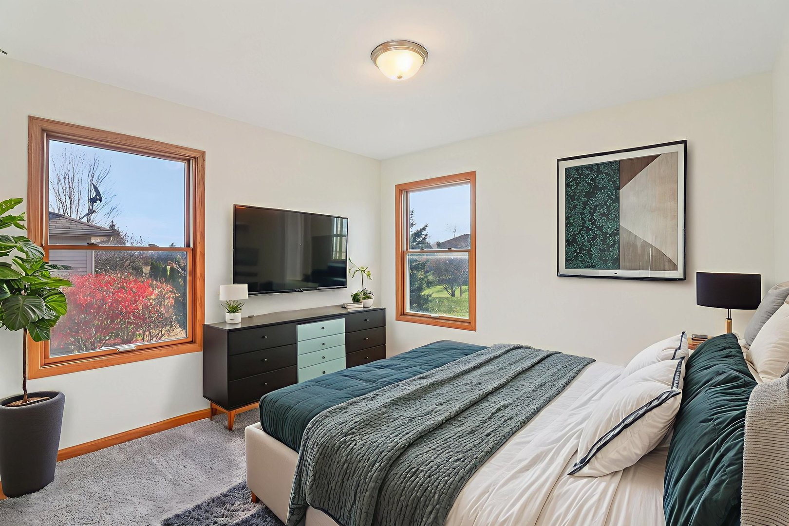 905 Randall Court Marengo, IL 60152 - Photo 4 of 28 a bedroom with a bed and a flat screen tv