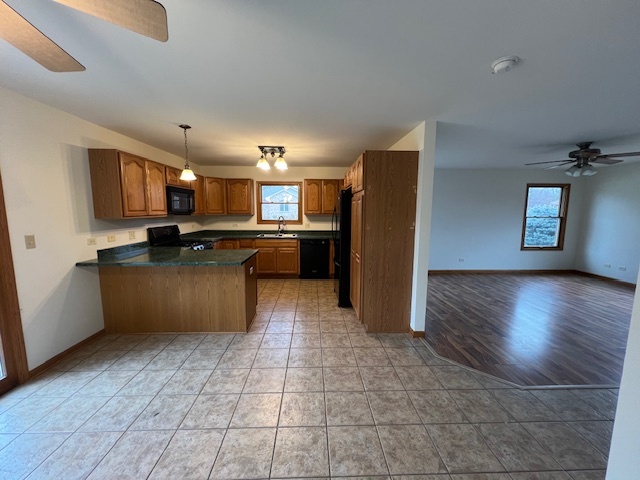 905 Randall Court Marengo, IL 60152 - Photo 8 of 28 a kitchen with stainless steel appliances granite countertop a refrigerator and a stove top oven