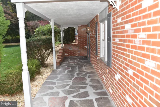 a view of a pathway both side of building