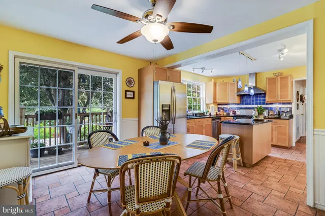 a bedroom with a bed and a table in it