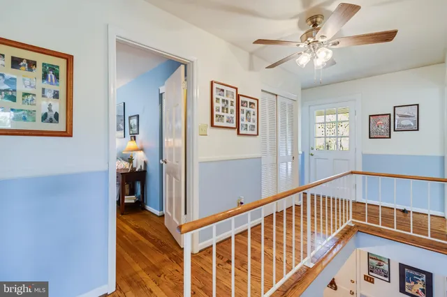 a view of a table and chairs under an umbrella