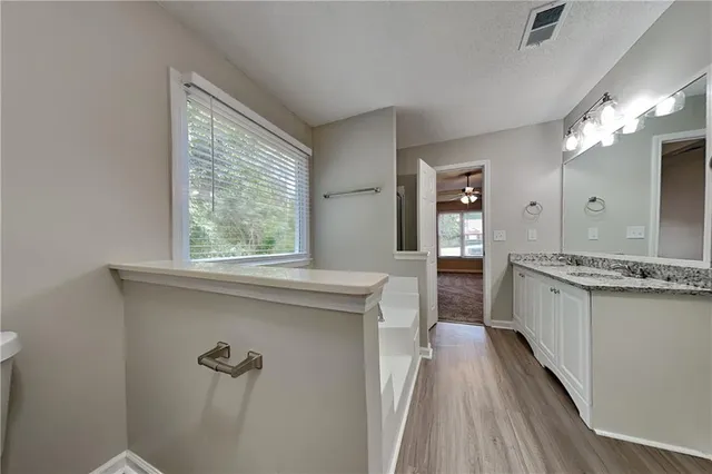 a kitchen with a sink stove and refrigerator