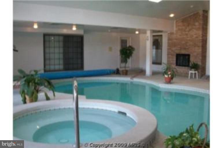 5913 Griffith Road Gaithersburg, MD 20882 - Photo 1 of 11 INDOOR HEATED POOL WITH 6 PERSON JACUZZI!