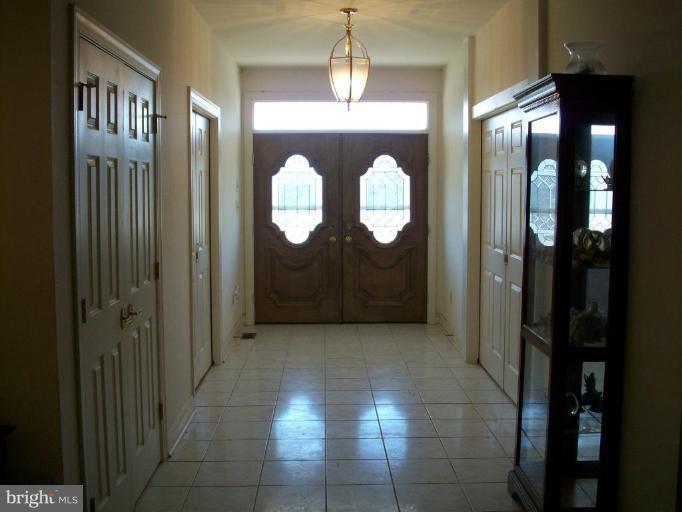 5913 Griffith Road Gaithersburg, MD 20882 - Photo 3 of 11 2 seperate marble foyers- main and inlaw suite