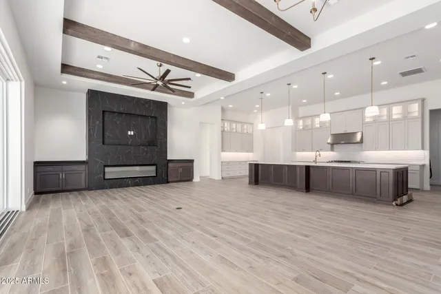 a kitchen with a stove and a sink