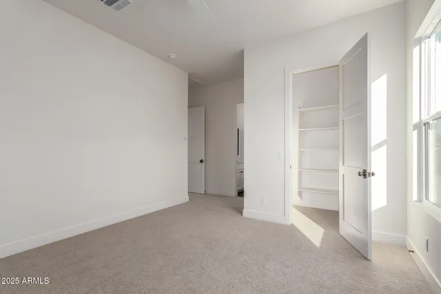 a backyard of a house with large trees