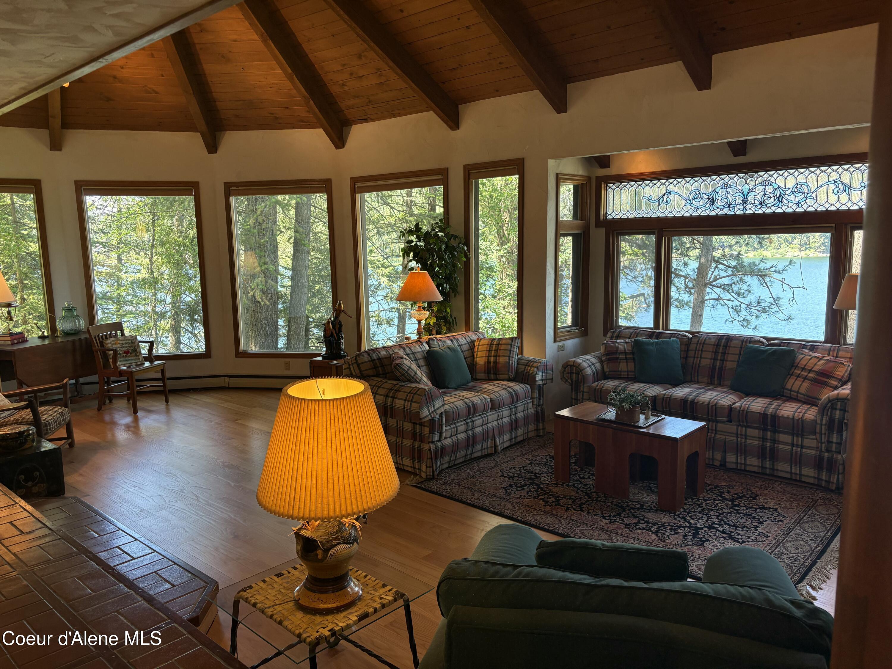 3337 South Lands End Road Coeur D'Alene, ID 83814 - Photo 16 of 49 Family Room Beamed Ceilings