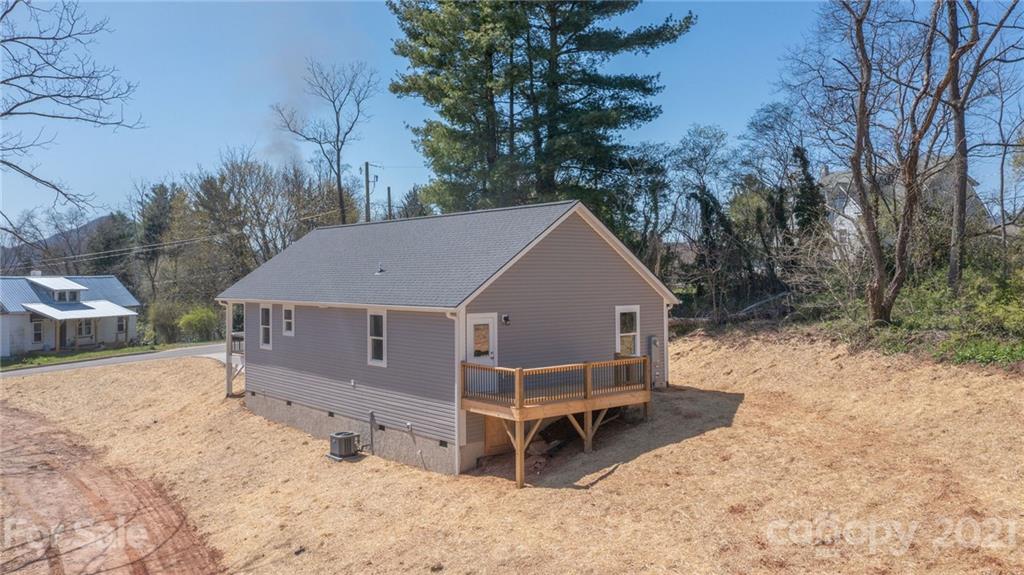 5 Sharptown Road Canton, NC 28716 - Photo 3 of 22 a view of a house with a yard