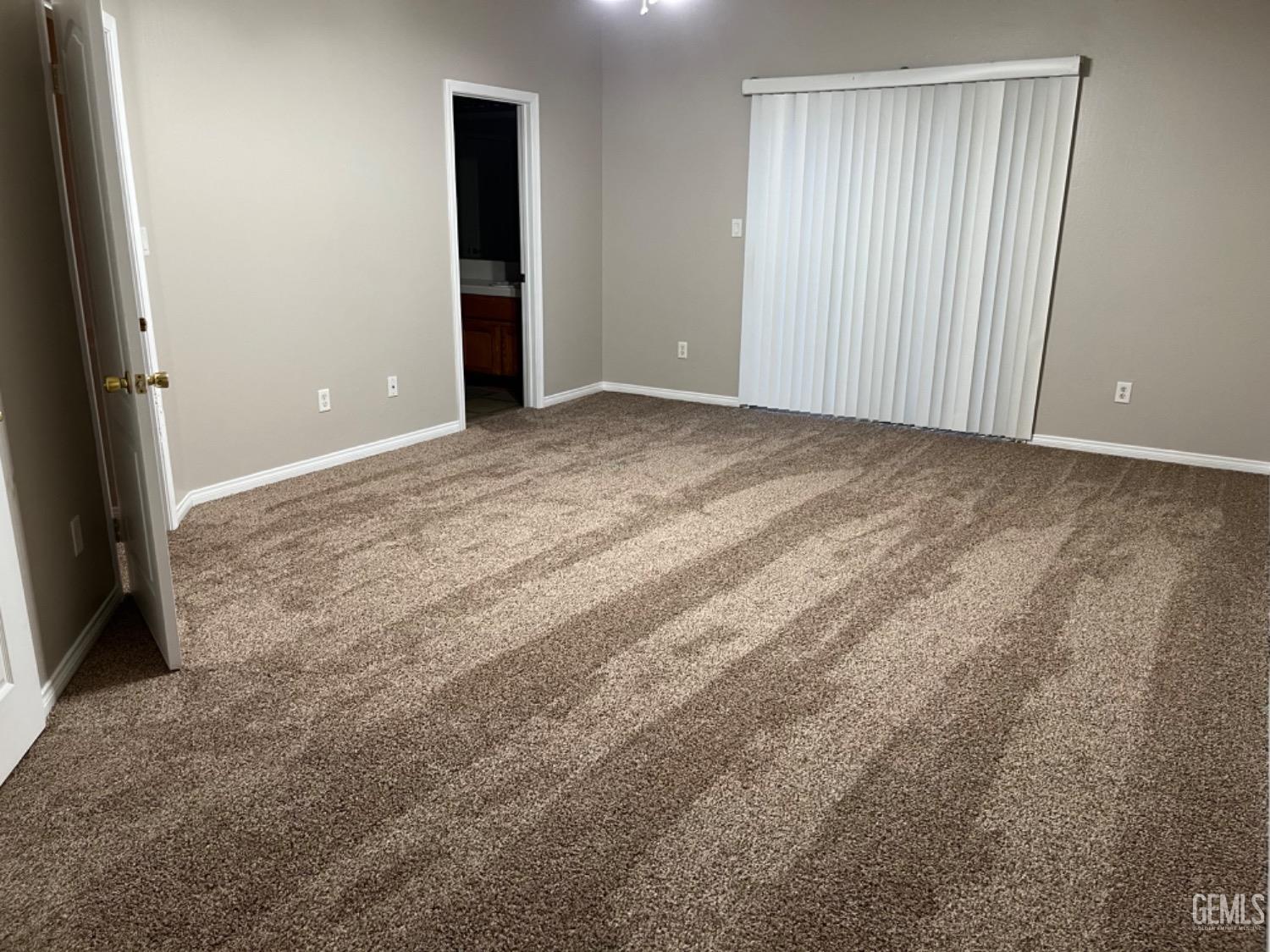 Undisclosed Address Bakersfield, CA 93311 - Photo 12 of 19 an empty room with an entryway