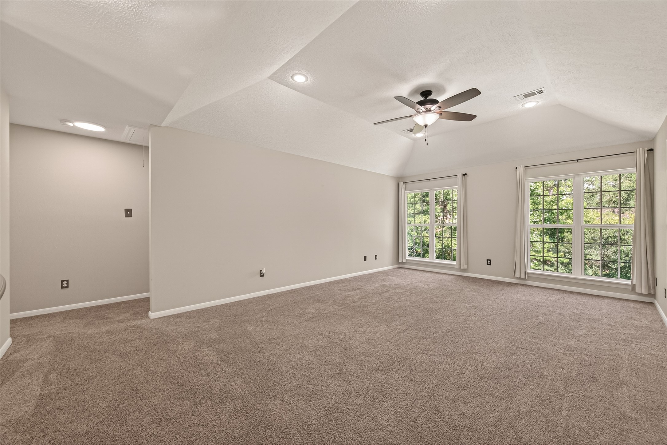 6131 Hampton Way Court Spring, TX 77389 - Photo 24 of 50 a view of an empty room with a window
