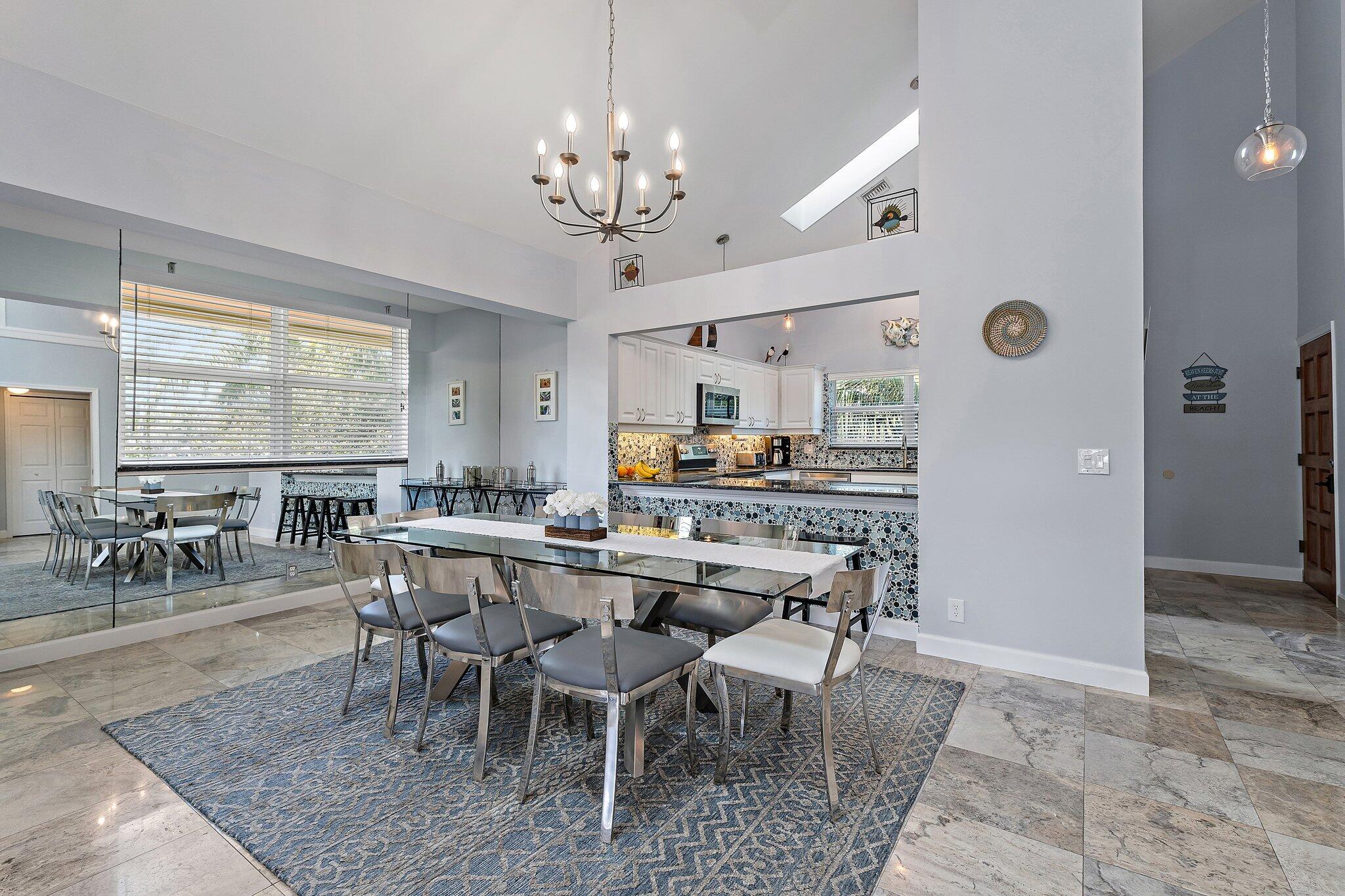4161 U.S. Highway 1, Unit G3 Jupiter, FL 33477 - Photo 17 of 71 a view of a dining room with furniture window and outside view