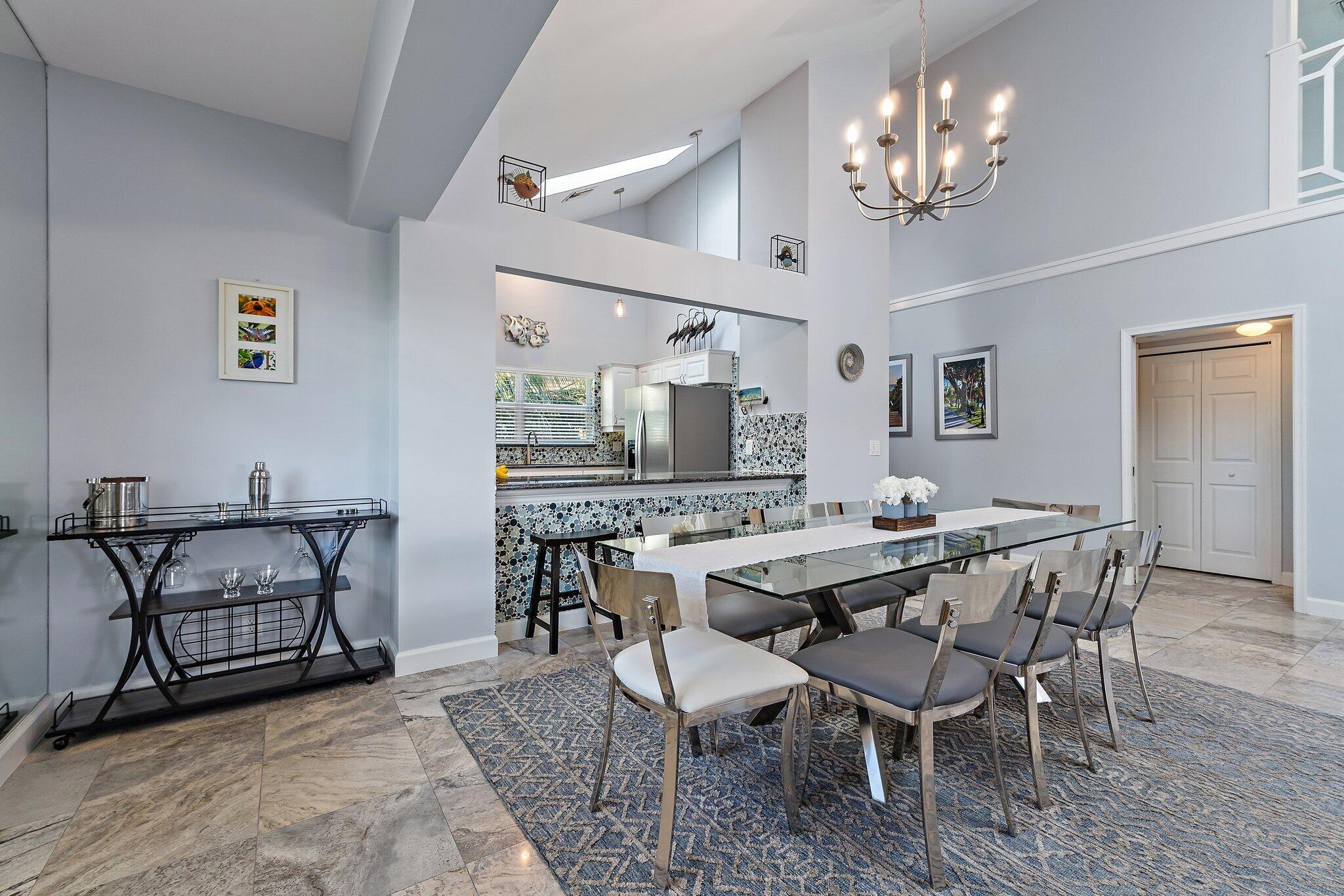 4161 U.S. Highway 1, Unit G3 Jupiter, FL 33477 - Photo 18 of 71 a view of a dining room with furniture