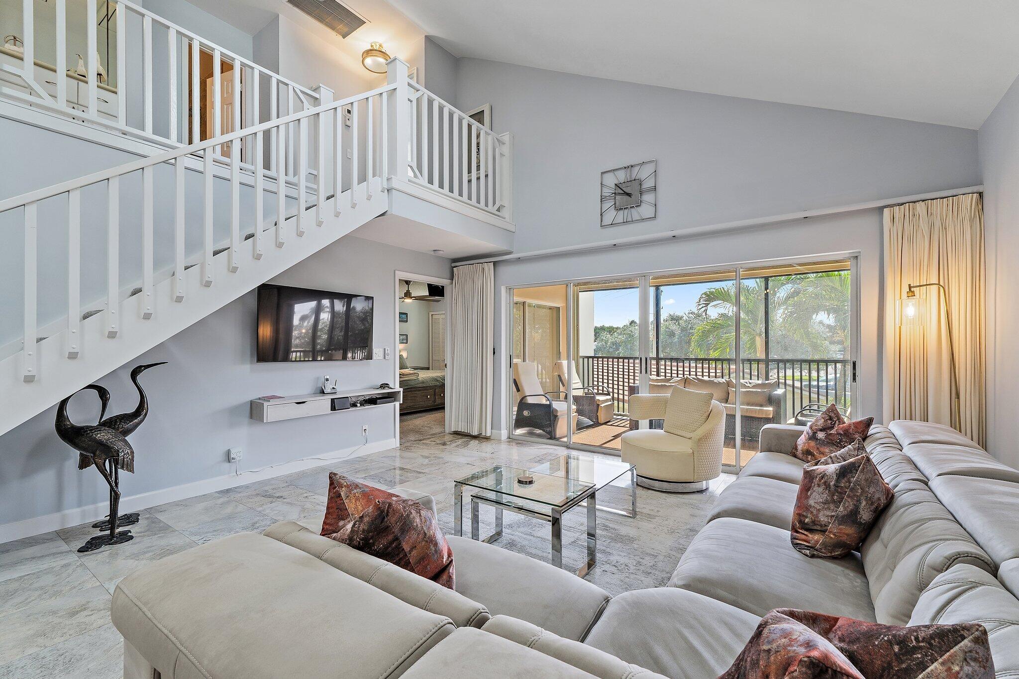 4161 U.S. Highway 1, Unit G3 Jupiter, FL 33477 - Photo 20 of 71 a living room with furniture